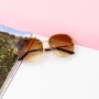 Frauen Sonnenbrille 9060 Brown Mode
